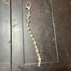 Purse charm or key charm.